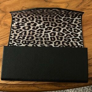 Chicos glasses case.